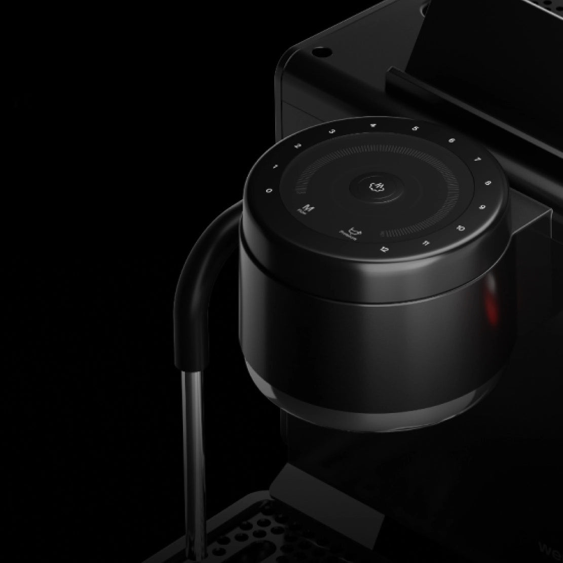 Black Wendougee LITA BA coffee maker on a freom the top showing the intelligent desk Vellutto.eu