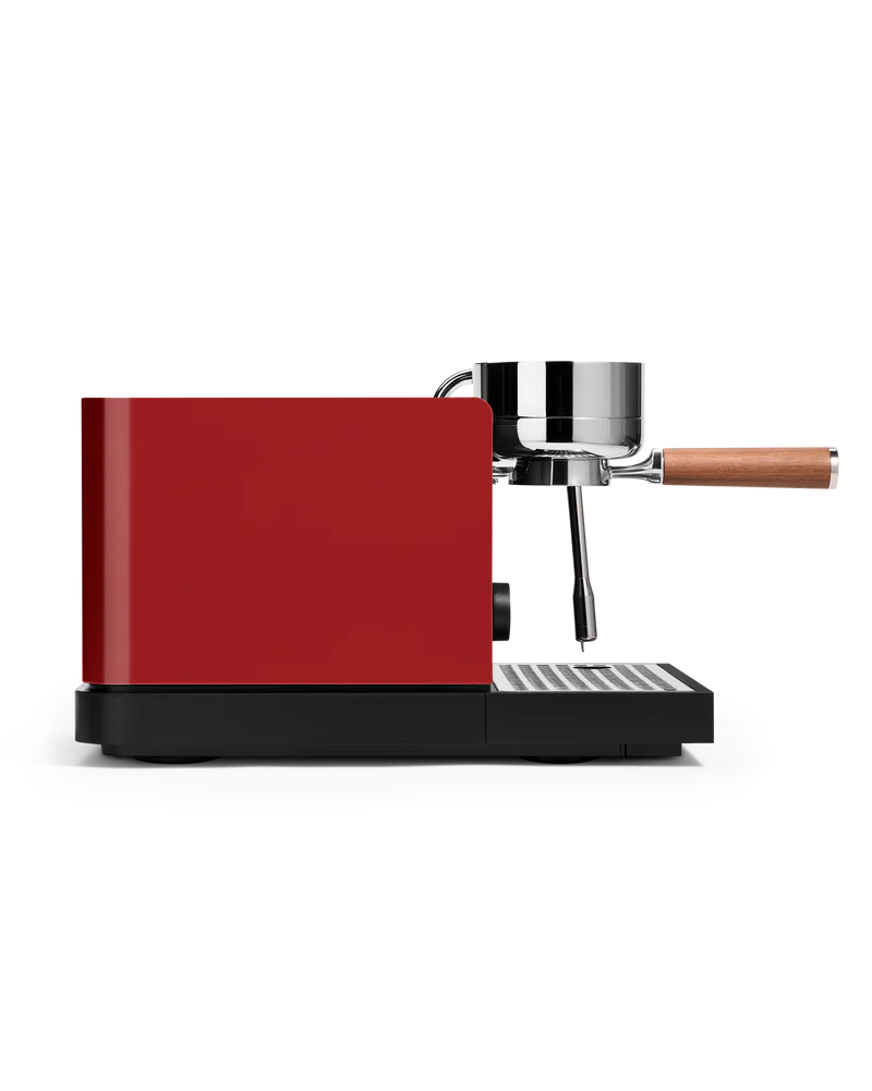RED Fellow Espresso Series 1 Espresso Machine side view with portafilter attached, showcasing sleek design and precision.