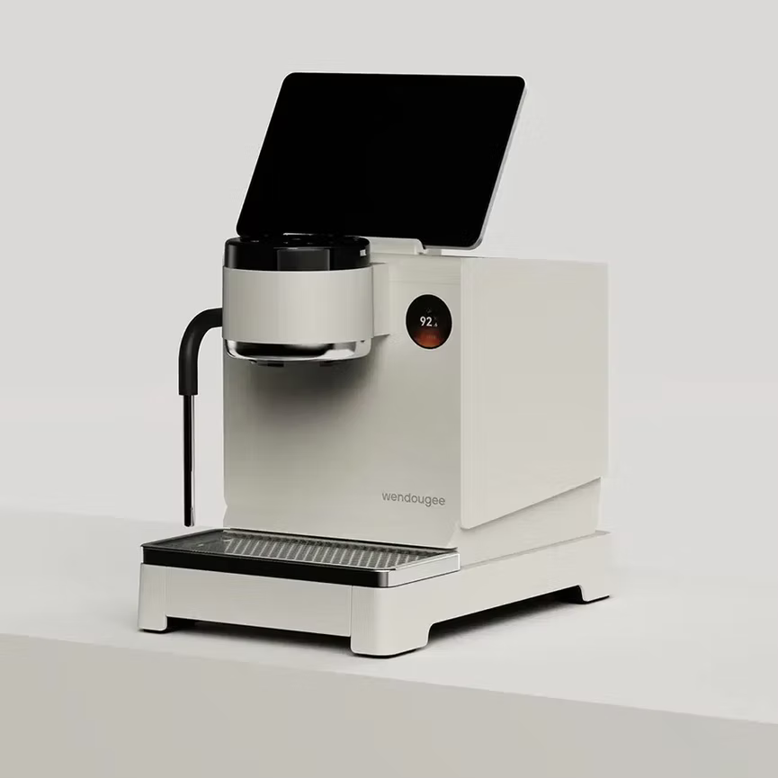 Wendougee LITA BA in white, three-quarter angle, showing the cool-touch steam wand and screen for the information showing the brew boiler temperature