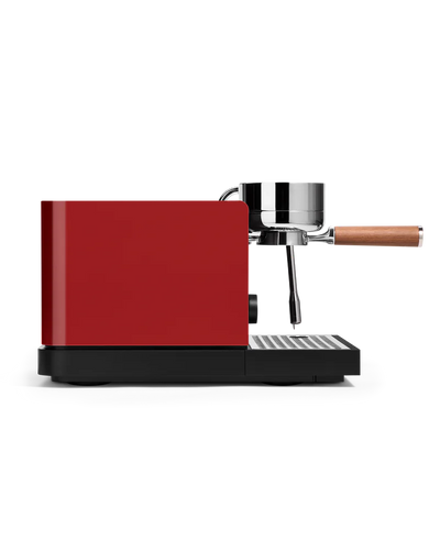 RED Fellow Espresso Series 1 Espresso Machine side view with portafilter attached, showcasing sleek design and precision.